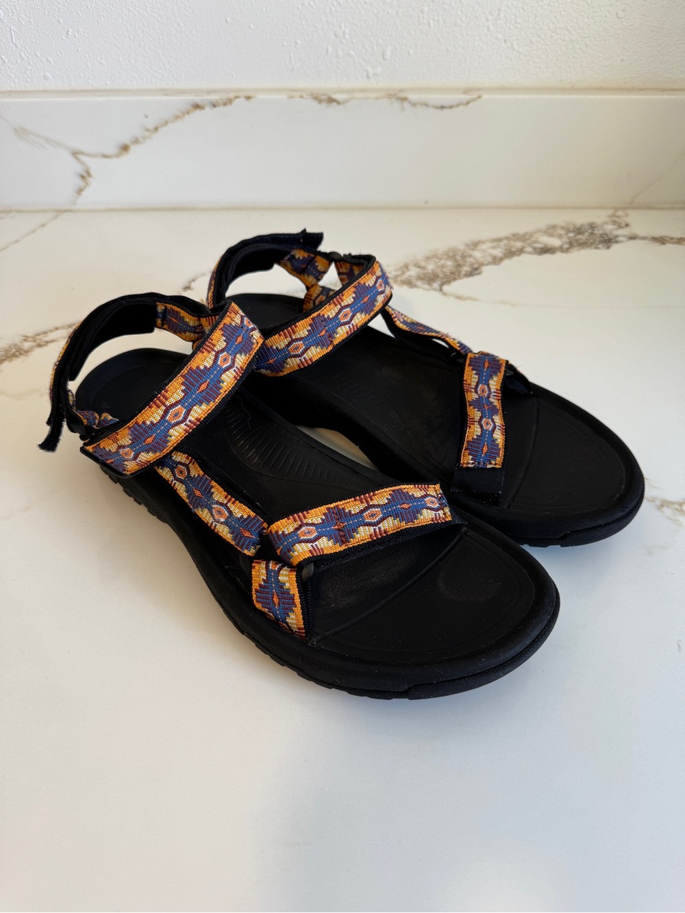 Teva Men's Black Sandals with Blue and Orange Patterned Straps